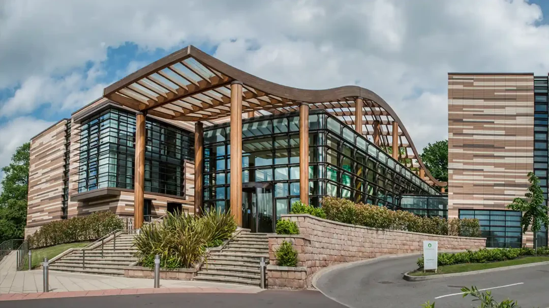 The modern, wood-and-glass exterior of the Orchard Hotel at Nottingham Venues, representing the premium hospitality spaces that saw a 17% increase in total revenue through Repeat Digital's SEO strategy.