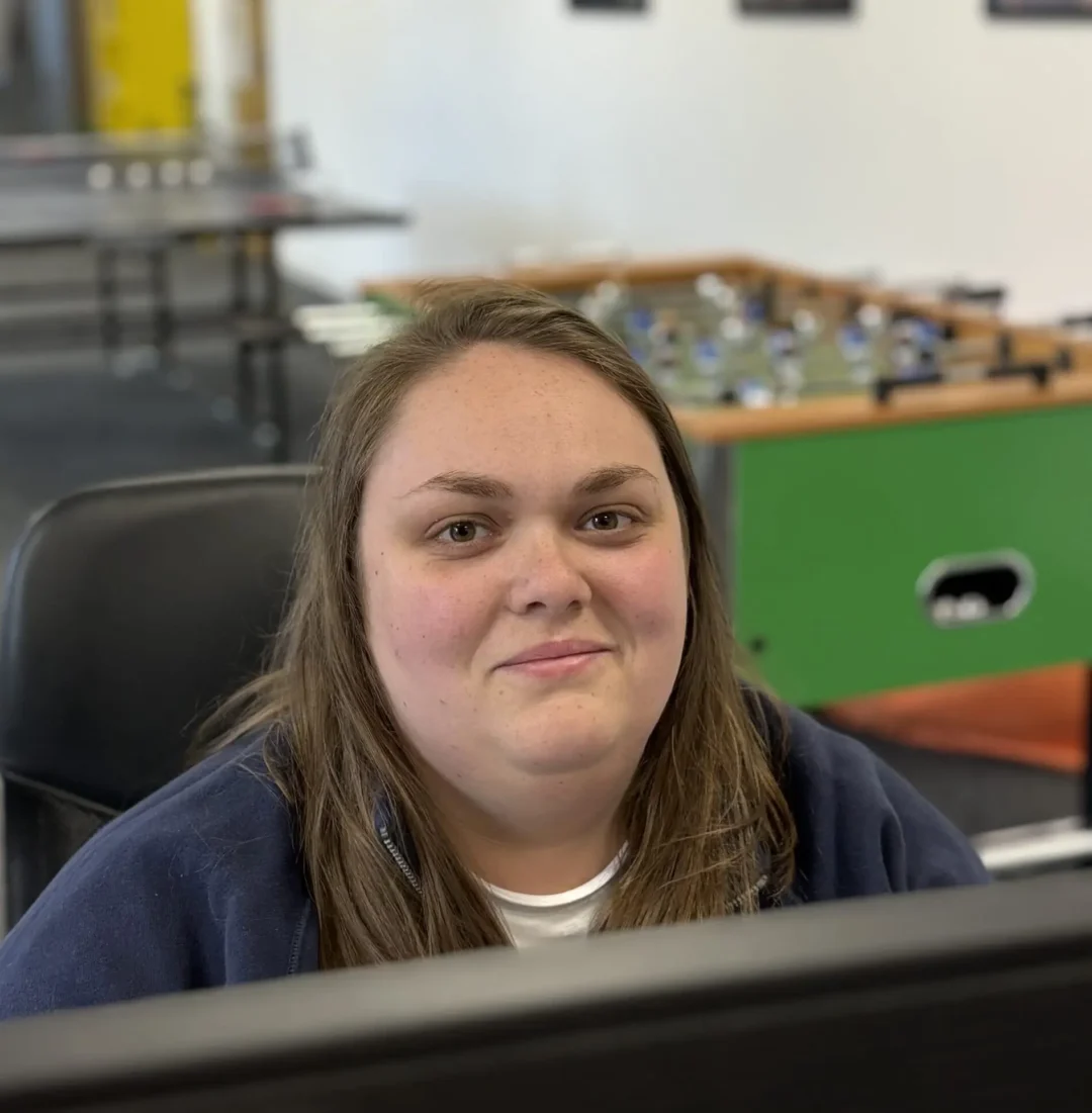 A portrait of a dedicated Local SEO specialist at the Repeat Digital office in Nottingham, representing personalised client support.