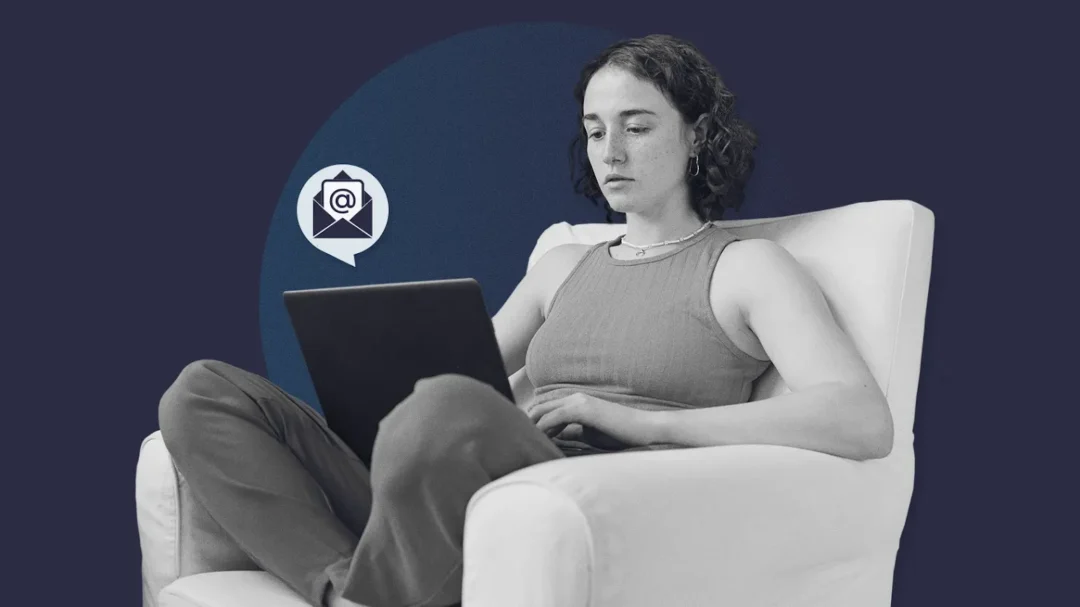 A woman sitting comfortably in an armchair using a laptop with an email icon overlay, representing digital communication and client inquiries.