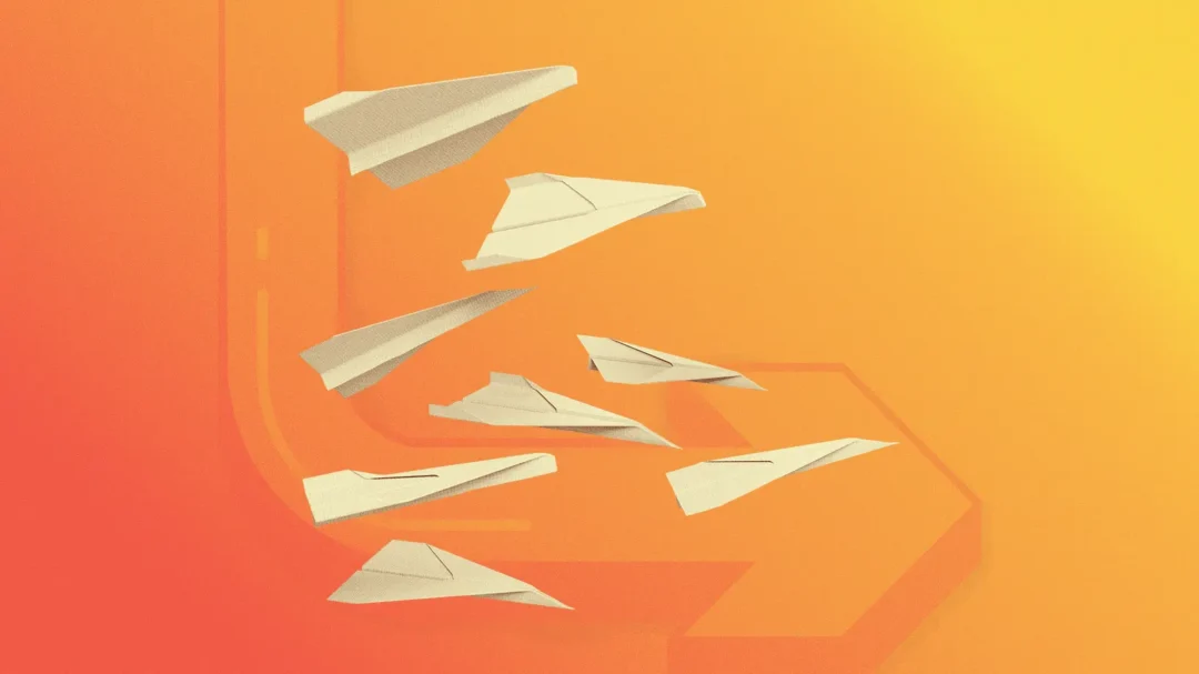 An illustration of multiple paper planes taking flight against an orange gradient background, symbolising the launch and distribution of paid social campaigns.