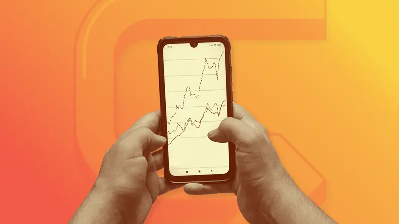 Hands holding a smartphone displaying a performance growth chart for Paid Social marketing.
