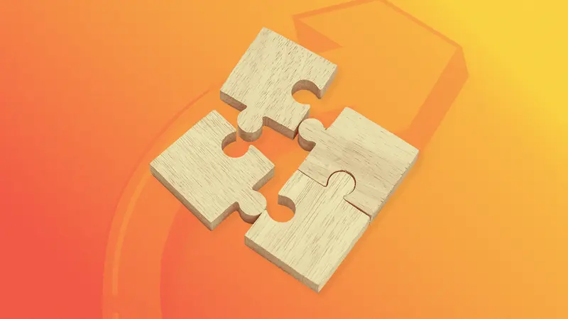 Four wooden puzzle pieces being joined together, representing a complete and cohesive SEO strategy.