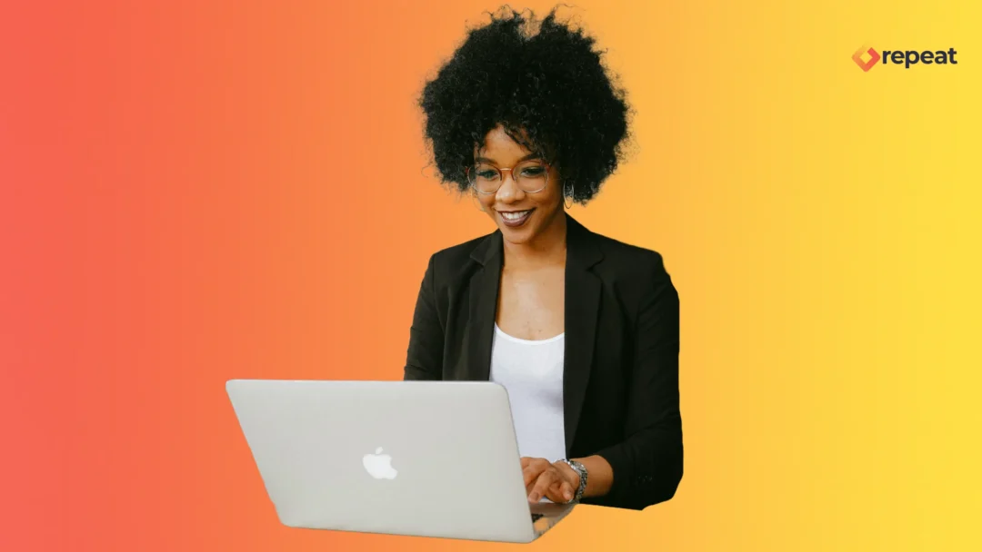 a woman using a laptop to manager her PPC campaigns utilisating AI