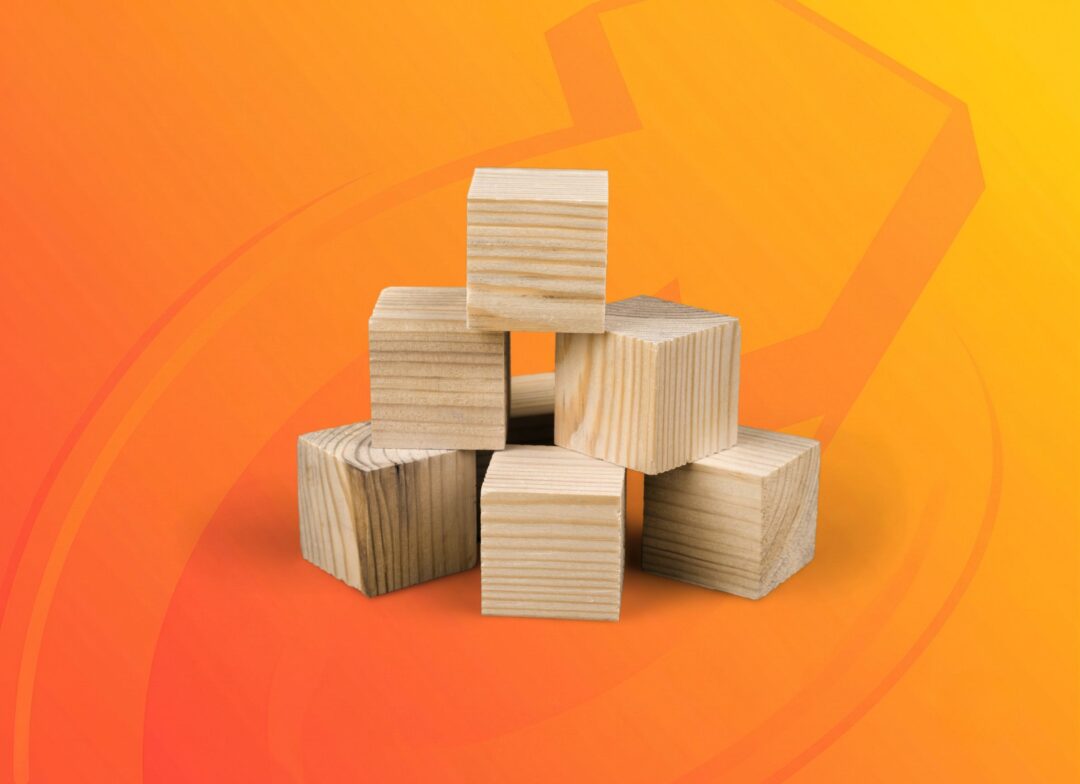 Wooden blocks icon representing authority building in Repeat Digital's GEO process.
