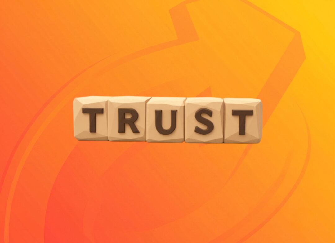 Wooden tiles spelling trust, representing authority and trust signals in Repeat Digital's GEO process